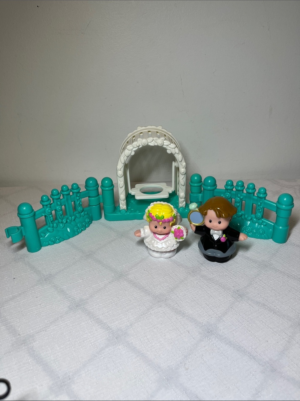 Fisher-Price Little People Wedding Set
White Arch Gazebo 
Teal Fence
Bride Groom